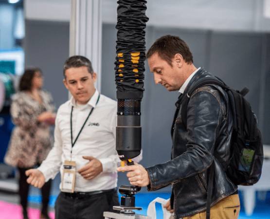 2 men and a machine at ALLFORPACK EMBALLAGE PARIS