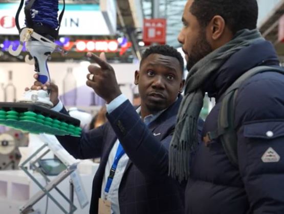 2-men-in-front-of-a-machine