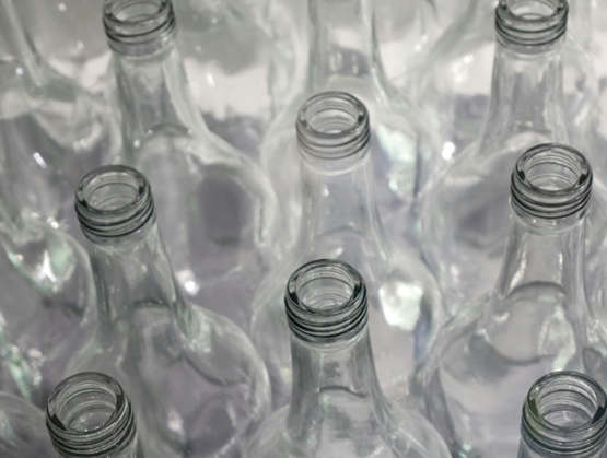 rows of clear glass bottles