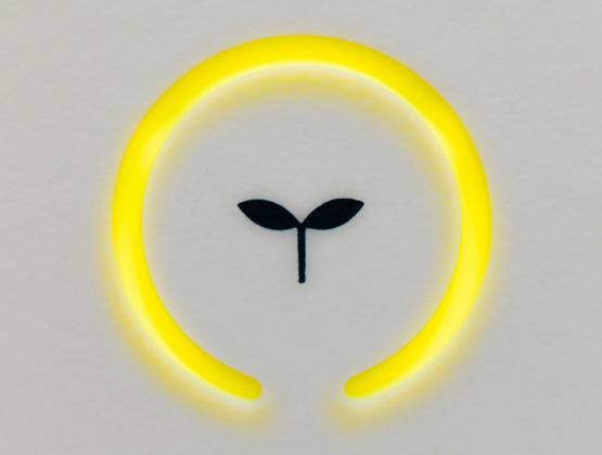 A luminous plant-inspired icon symbolizing sustainable innovation and bio-based materials