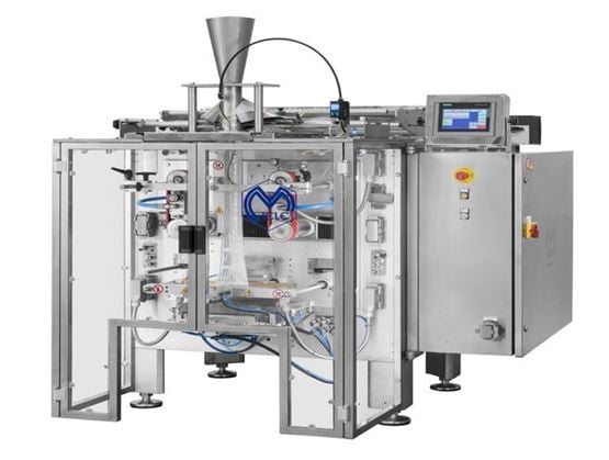 Ensacheuse verticale industrielle en acier inoxydable utilisée pour le conditionnement automatisé de sachets.