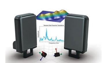Two electronic devices frame a 3D visualization displaying a Fast Fourier Transform (FFT), including a frequency graph and directional axes illustrating signal analysis.